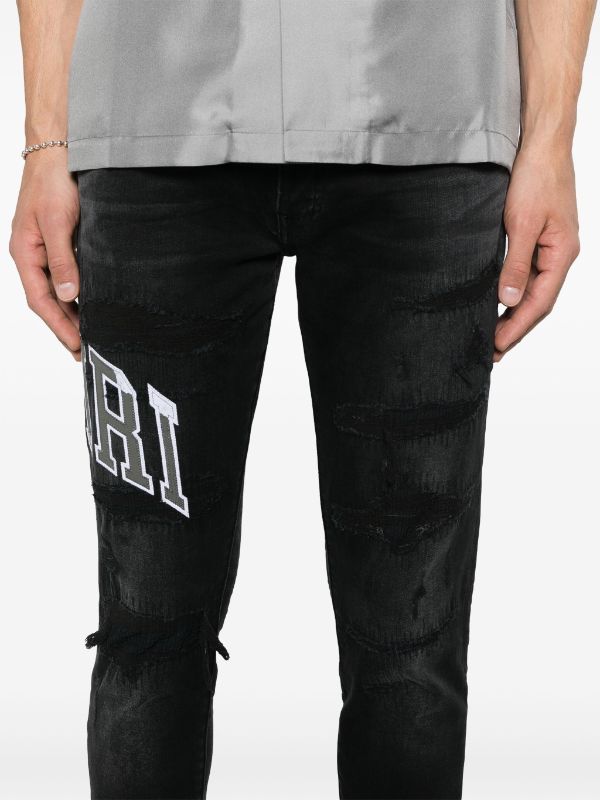 AMIRI (Varsity Logo Reparatur Jeans)